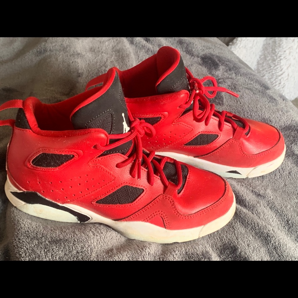 Youth high top red Jordan sneakers size2y